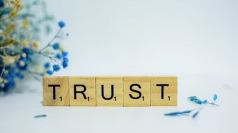 photo credit: https://unsplash.com/photos/bGOemOApXo4 / a wooden block that says TRUST