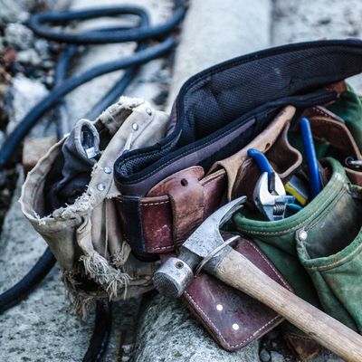 Tool belt and carpentry tools; photo credit: Unsplash 